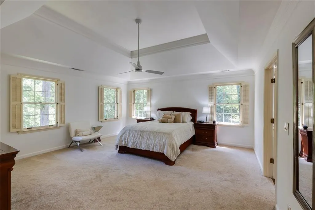 Trey ceiling with dual walk-in closets