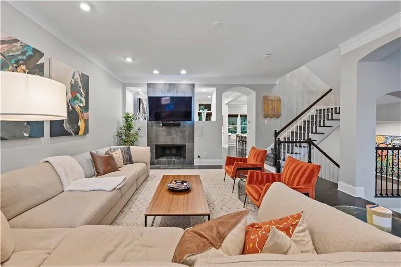 Another view of this wonderful and well appointed space. Here you can see into the kitchen and beyond into the lush and green, private backyard!