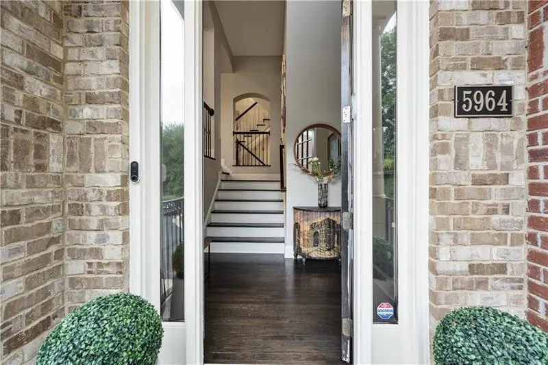 Welcome Home! Grand entry foyer with dramatic arches and architectural interest immediately draws you inside!