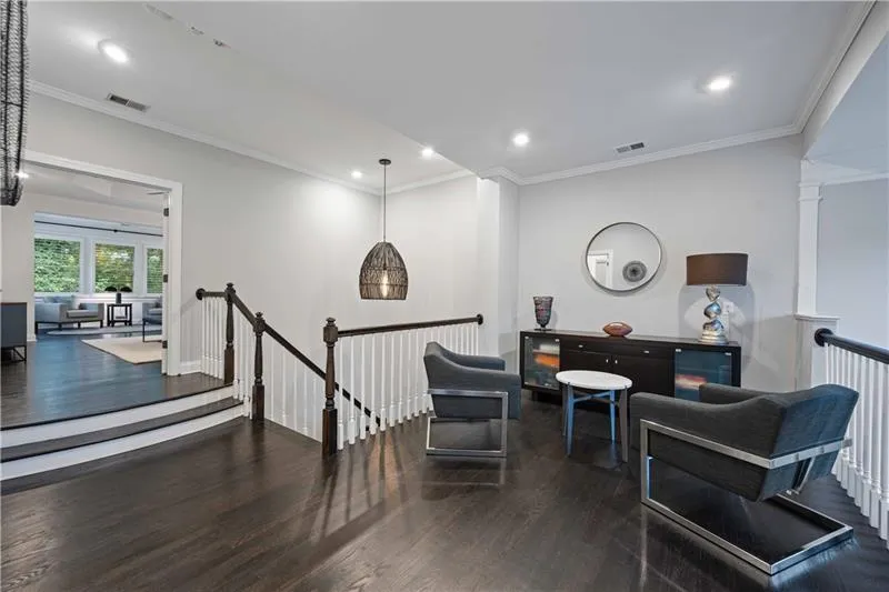 Second floor living space, with a wonderful and spacious loft area to be used as you like - revealing the dramatic entry into the Primary Suite.