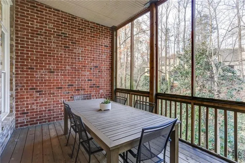 Covered, screened in patio just off the kitchen is a perfect space to enjoy a meal outdoors year round! Get all the fresh air of a crisp Fall day or a lovely breeze in the Spring without any of the bugs or worrying about furniture in the rain!