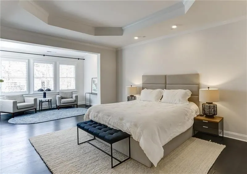 Stunning Primary Suite with tons of natural light and separate sitting area! So much luxurious space behind every door!