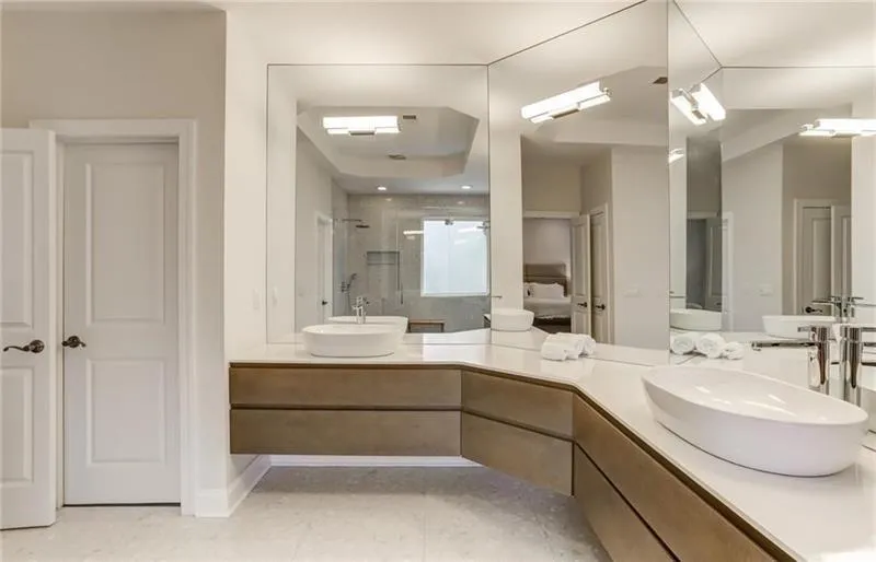 The Primary bathroom is incredible! This newly designed space has so much space to move about and tons of counter and drawer space making organization easy and enjoyable!