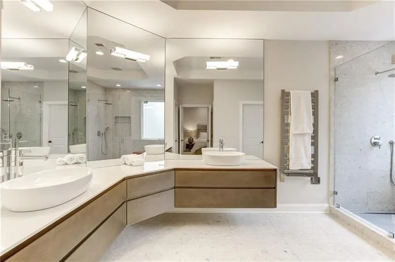 This spa like feel space has tons of square footage and plenty of room to add other accessories to this space should you desire!