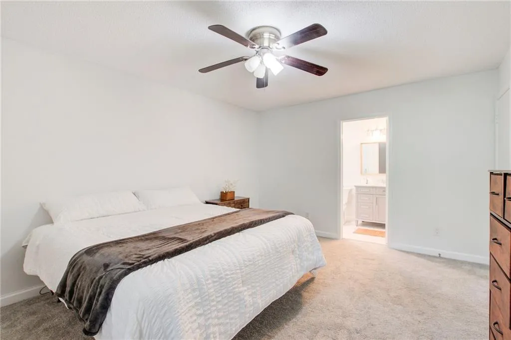 The primary suite is spacious. New carpet, paint and a  beautiful spa like bathroom.
