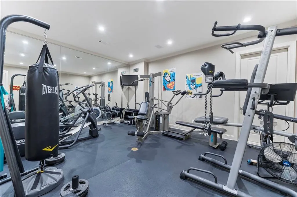 This home features a large and convenient home gym space.