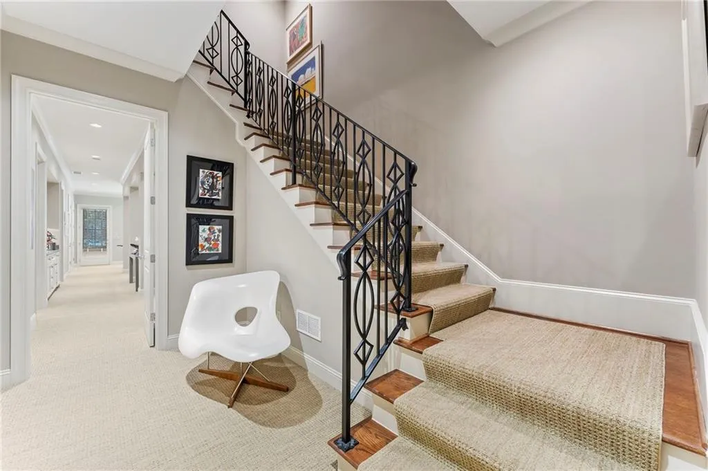 The terrace level covers the entire footprint of the home and has a full bedroom with ensuite bath, game and media space, craft and hobby space, workout room, a half bath for guests, and has tons of natural light.