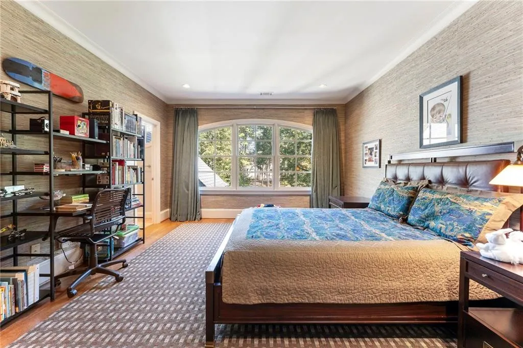 The center bedroom has a large picture window with views to the front yard. Each bedroom has its own ensuite baith and large walk-in closet,