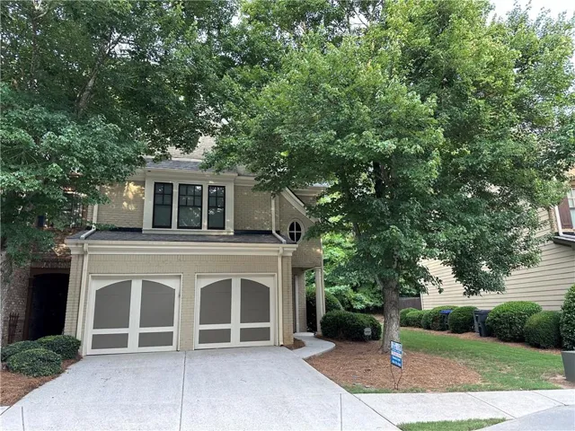 View of front of home with two car garage