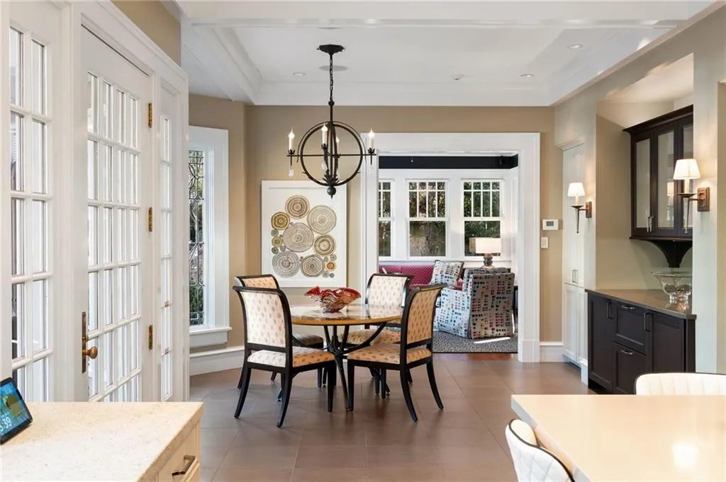 Dining room featuring a chandelier and light tile patterned floors
