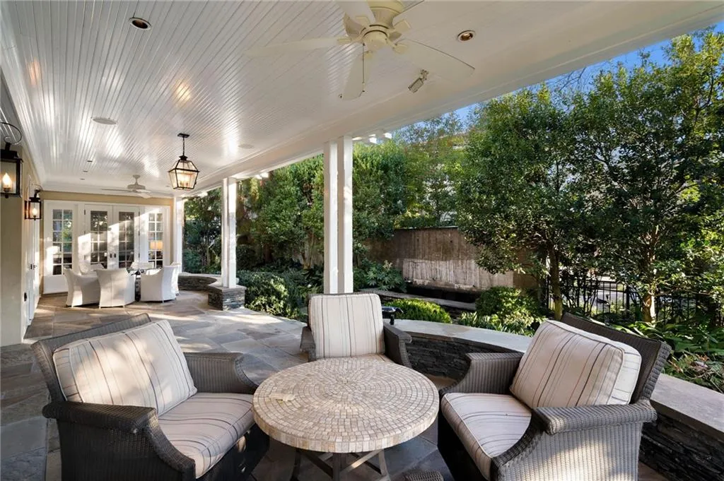 View of patio / terrace featuring ceiling fan and french doors