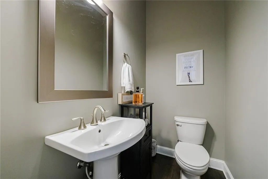 A conveniently located half bath completes the main level.