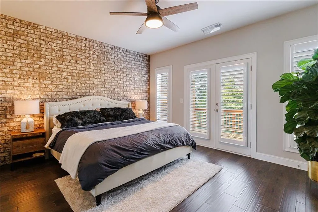 Upstairs, the oversized owner’s suite is a private oasis