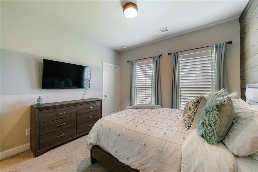 The secondary bedroom also features an ensuite bathroom