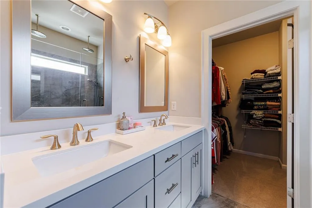 The bathroom features a generous-sized walk-in closet.