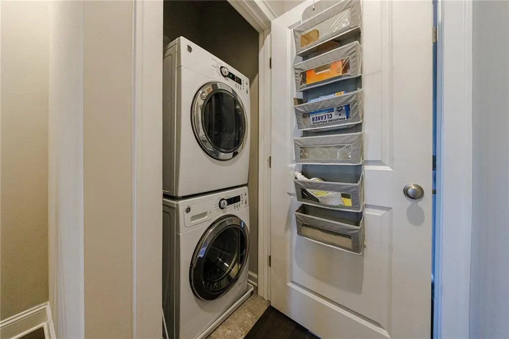 The laundry area is conveniently located between both bedrooms
