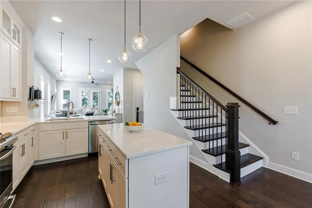 The kitchen with a beautiful stone island.