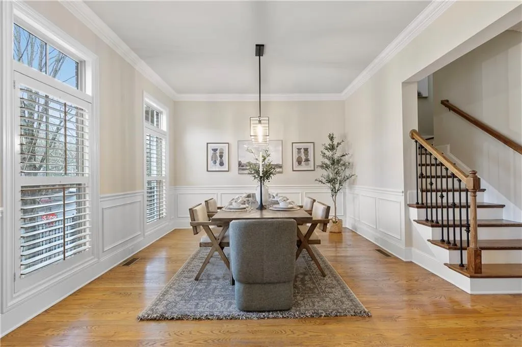 Dining space with an inviting chandelier and 9-foot ceilings