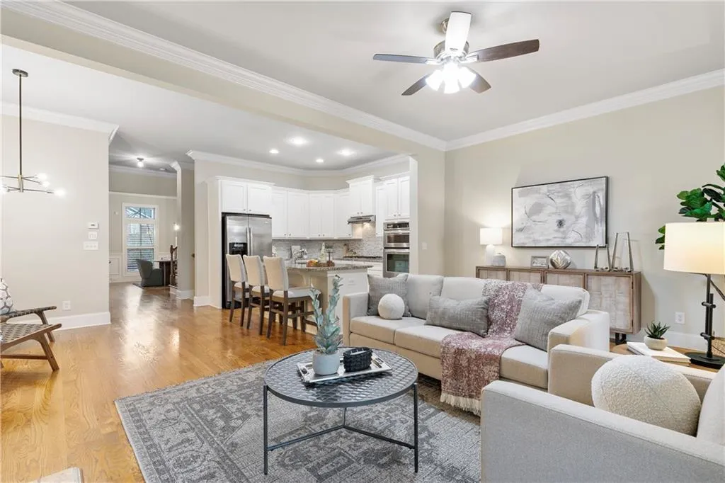 Open floor plan view of kitchen, living room, and eat-in kitchen