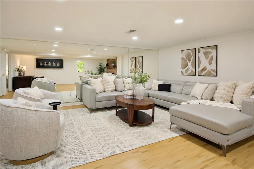 The terrace level living room is the perfect spot for movies or watching the big game.