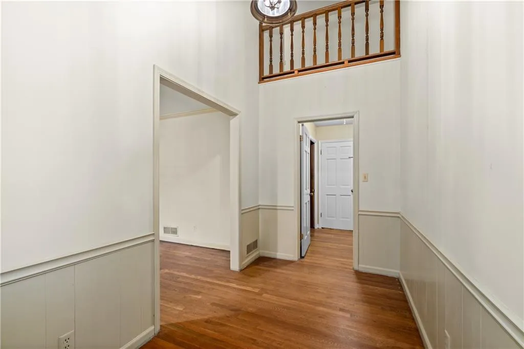 Spacious two-story entry foyer with hardwood floors!