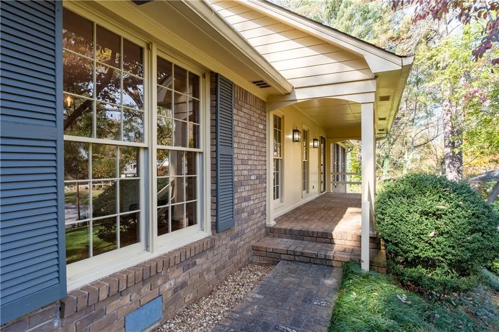 Covered porch to formal front entry!