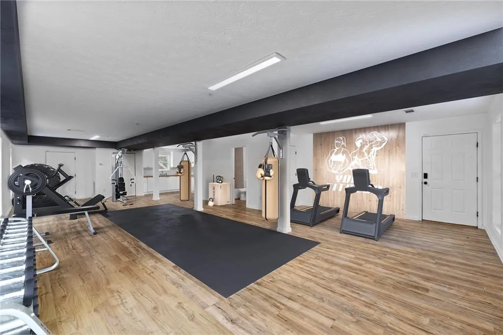 Virtually rendered depiction of gym, yoga or dance studio.