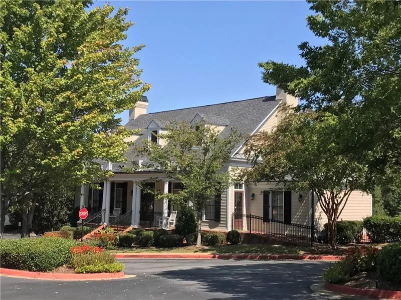 View of front of property featuring a chimney