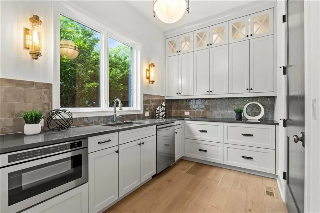 Scullery incl dishwasher, microwave, walk in pantry, sink for convenience