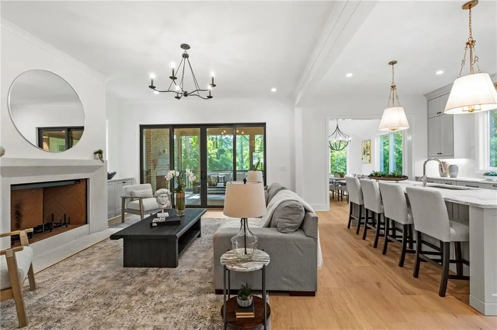 Family room & dining room open to kitchen and screened porch...perfect for entertaining