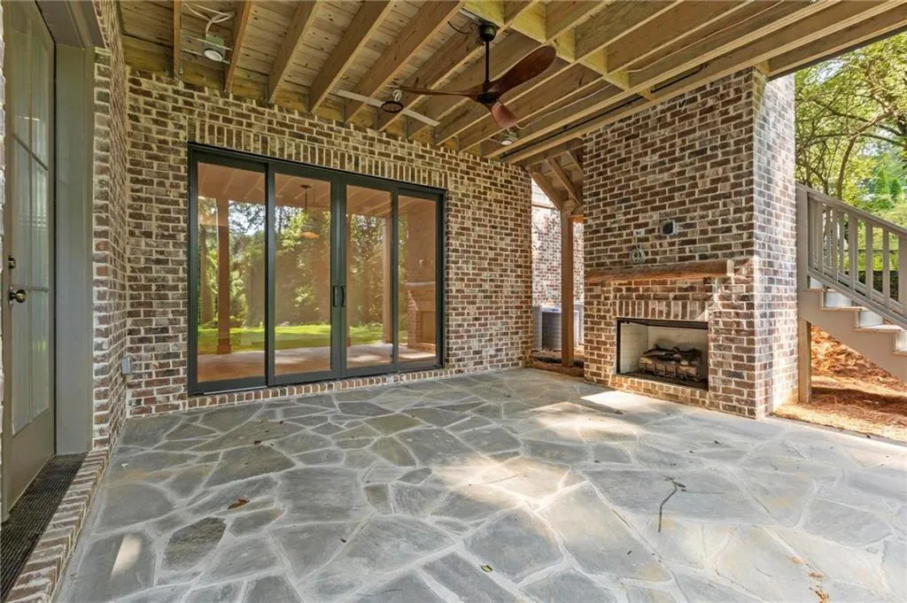 Terrace level patio with fireplace