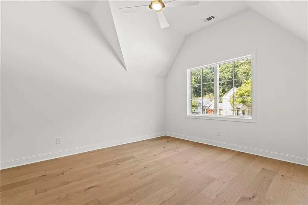Bedroom 2 High ceiling and connecting full bath