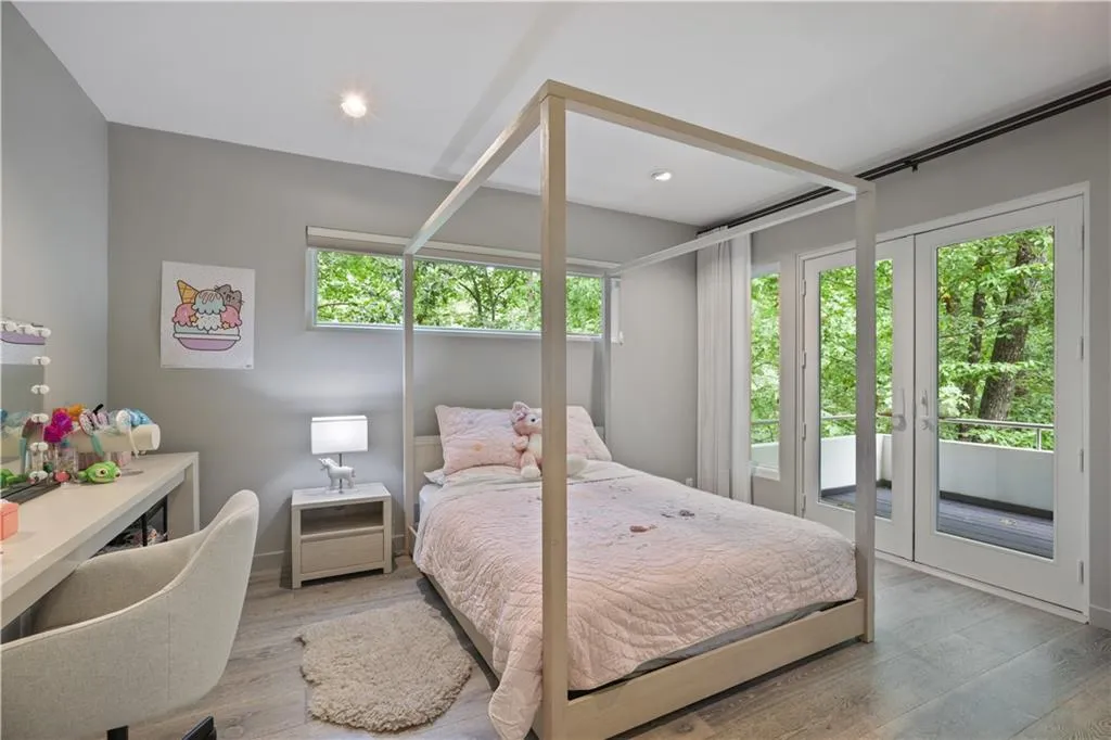 Secondary bedroom with access to the porch.