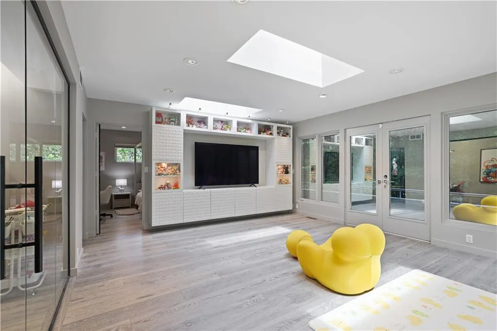 Bonus room with skylights and leads to the private deck.