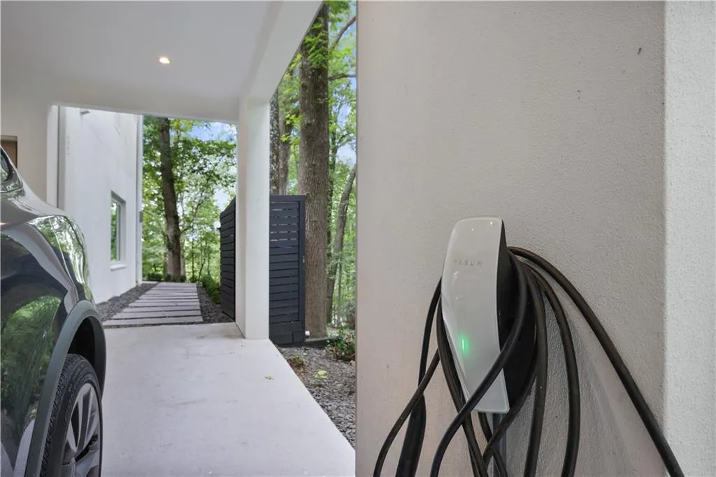 Tandem carport with charging station.