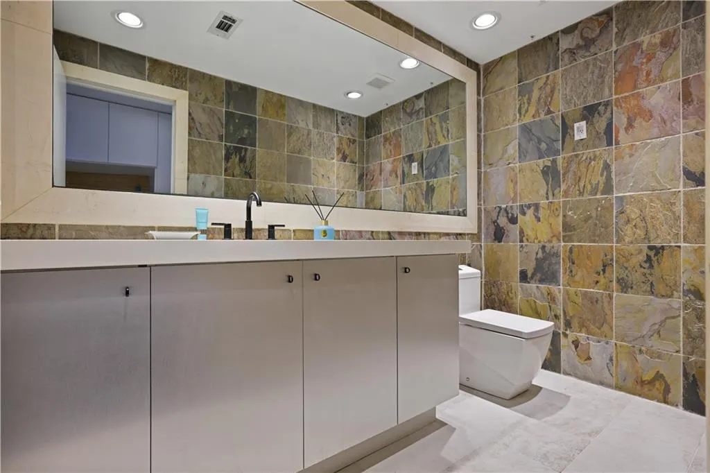 Ample room to create a full bath which would allow for a second bedroom on the main level.