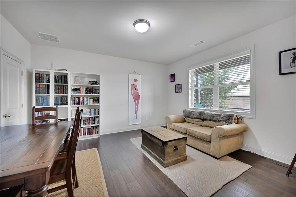Living area with wood-type flooring
