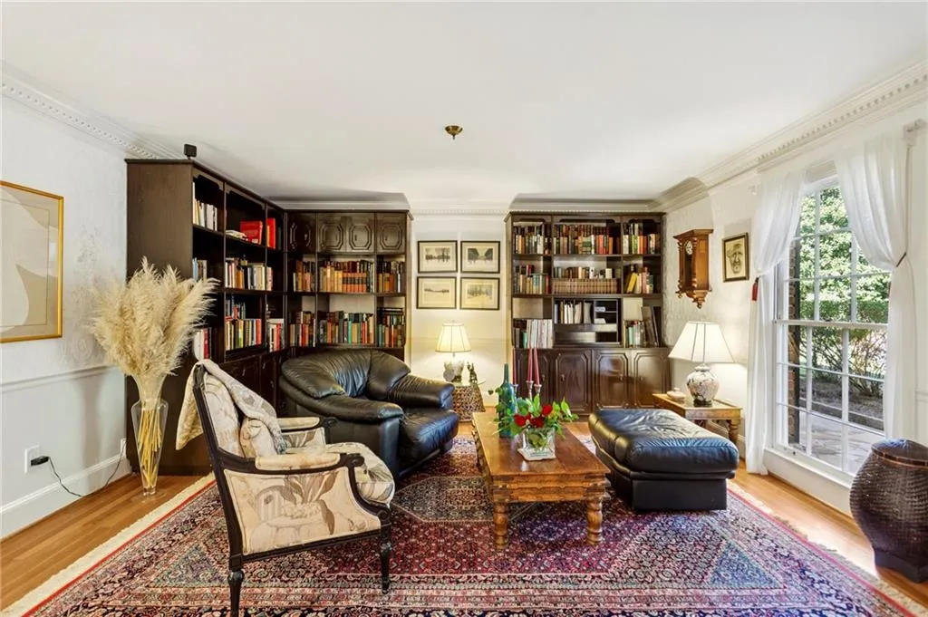 Formerly the dining room, this library/sittingn room could be converted back to a formal dining room