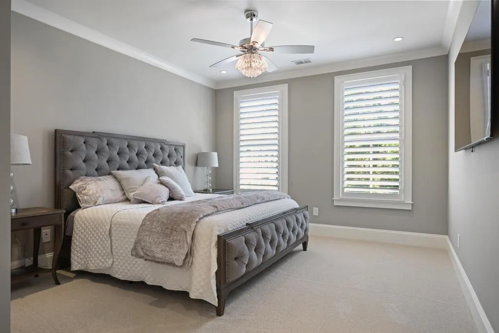 Bedroom featuring light colored carpet, crown molding, ceiling fan, and recessed lighting