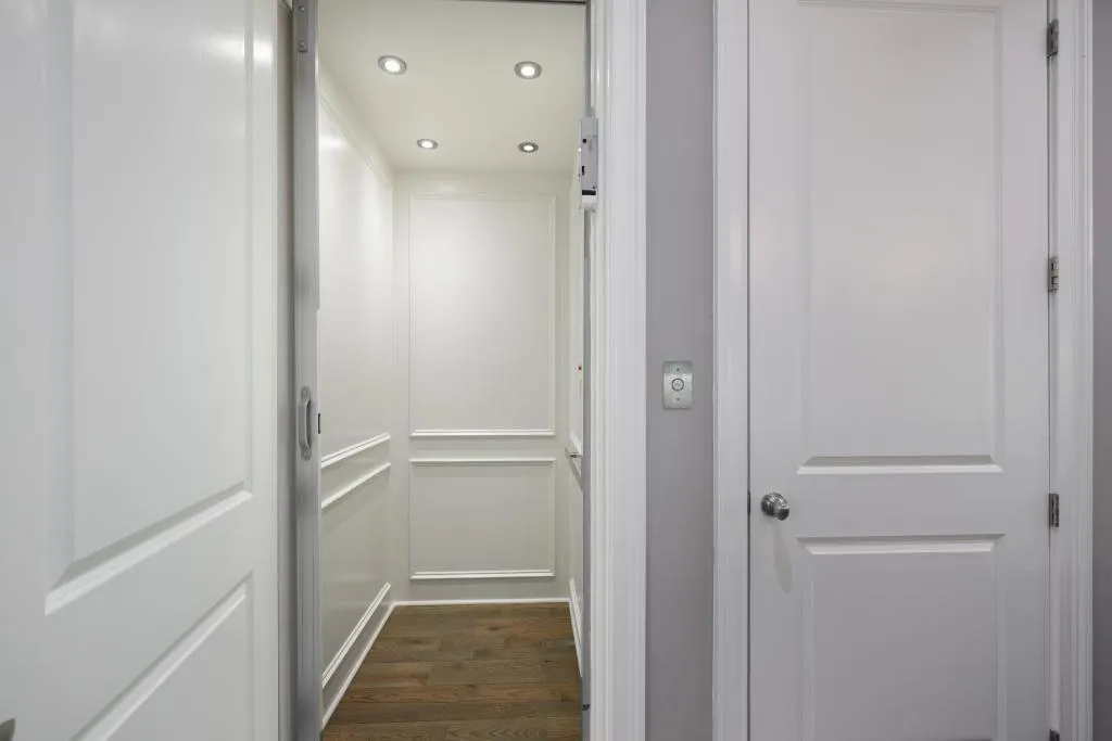 Elevator featuring recessed lighting and wood finished floors