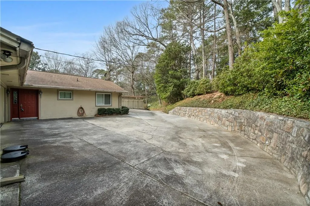 View of patio / terrace with concrete driveway