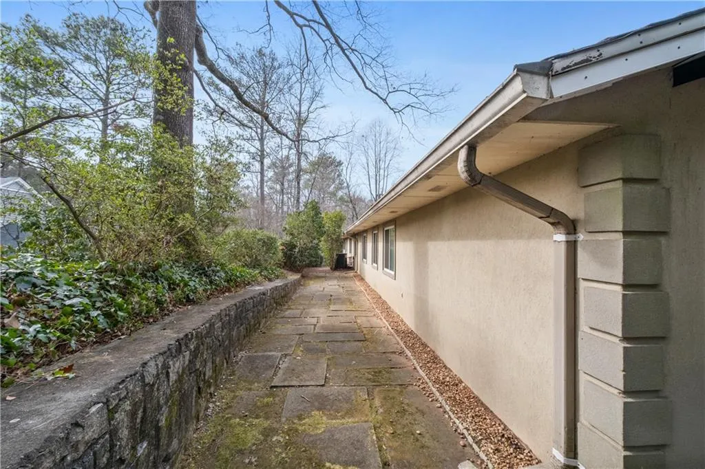 View of property exterior with stucco siding