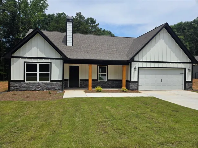 White board and batten exterior with dark trim accents