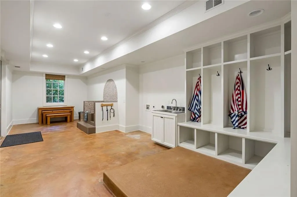 Second laundry room with dog spa and built in storage