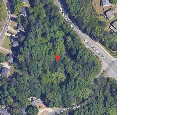 Aerial view of property's location featuring property parcel outlined