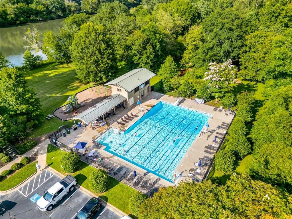 Drone / aerial view of the Huntcliff Club Pool & the Chattahoochee River