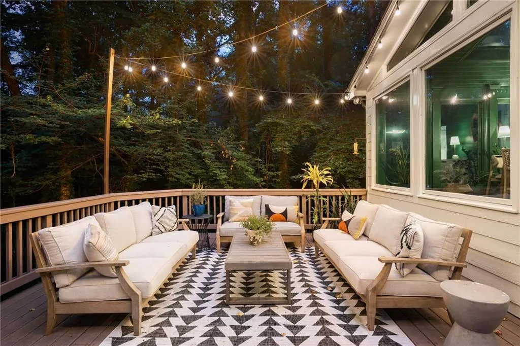 Wooden deck featuring an outdoor hangout area
