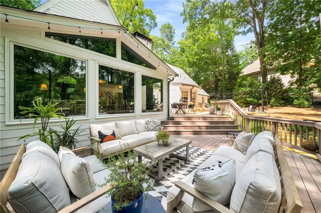 Wooden terrace featuring outdoor lounge area