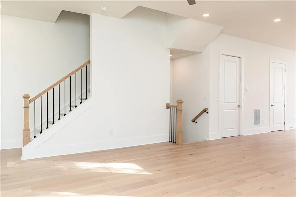 Living Room showing staircase to third floor.