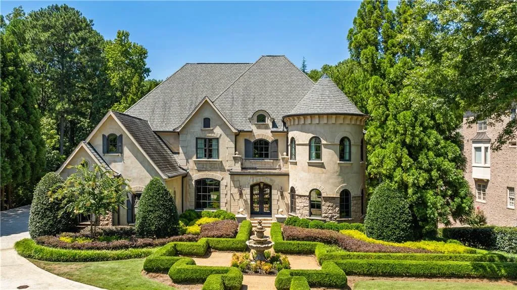 French country home with a balcony